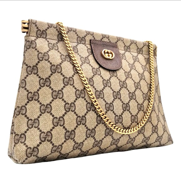 Gucci Handbags - Gucci GG Supreme Clutch Bag